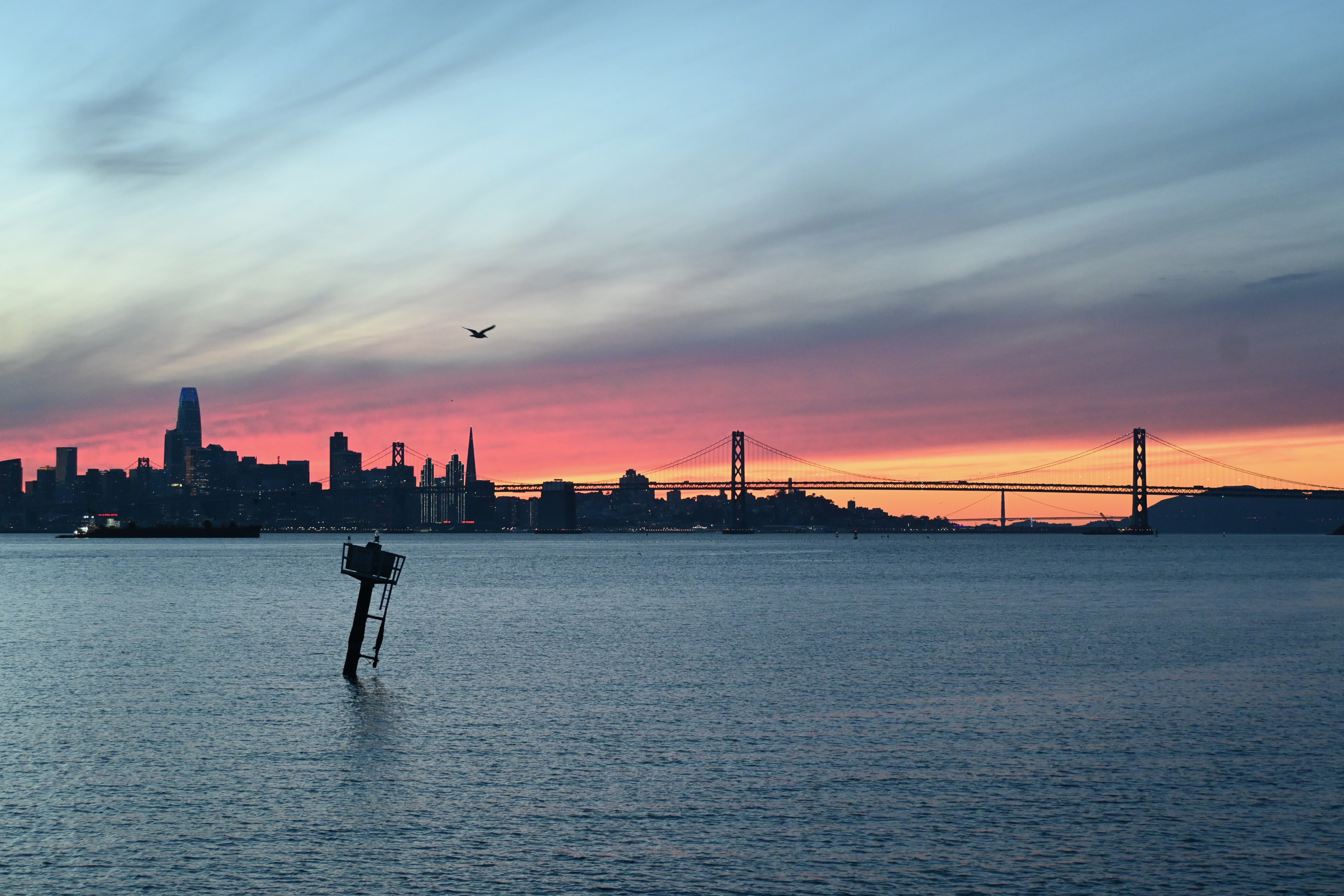 sunset behind the Bay Bridge — photograph by A.B. Quine